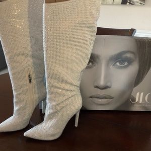 JLo boots NEW in box. Never worn. Size 7